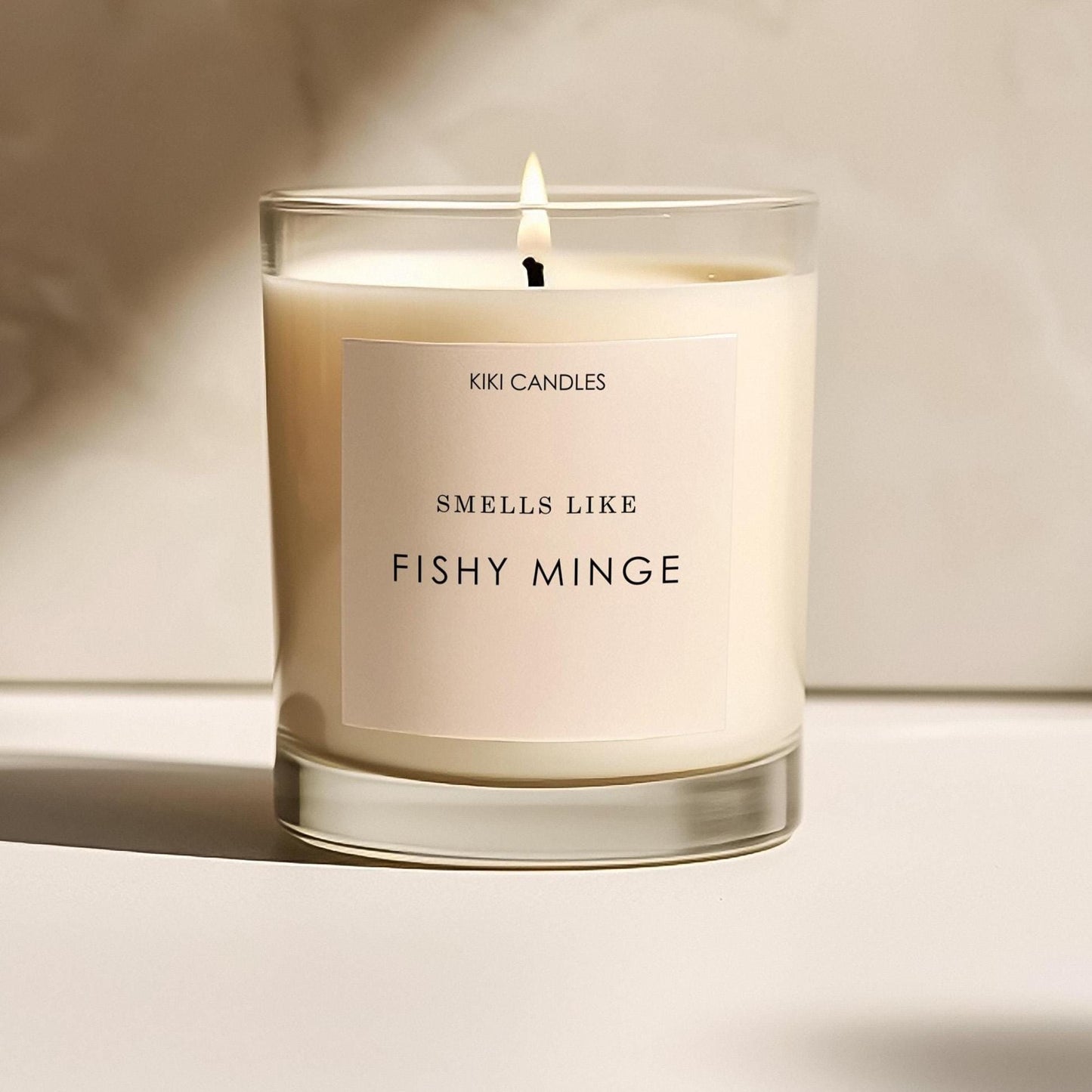 “Fishy Minge” funny soy candle – minimalist jar candle with beige label, cheeky gift for friends, handmade in the UK.
